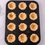 mini crusts in muffin tin for pumpkin rice krispie treats