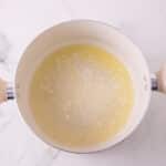 melted butter in pot for rice krispie pumpkin pies